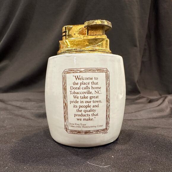 Vtg Doral Refillable Lighter Village of Tobaccoville The Place Doral Calls Home - Picture 3 of 8